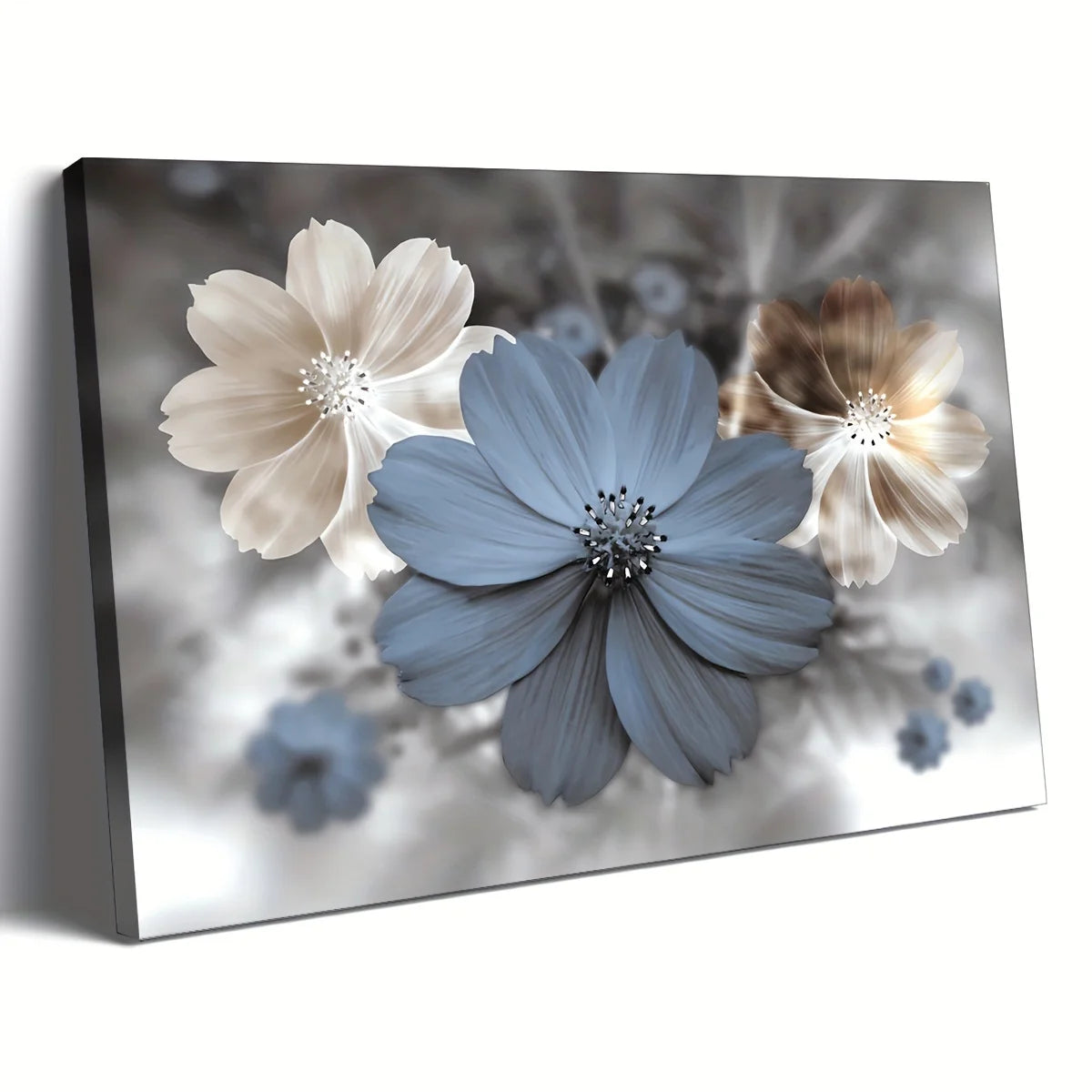 A rectangular wall art canvas showing three stylized flowers against a soft blurred gray background. The center flower is muted blue-gray, with cream and taupe flowers on the left and right.