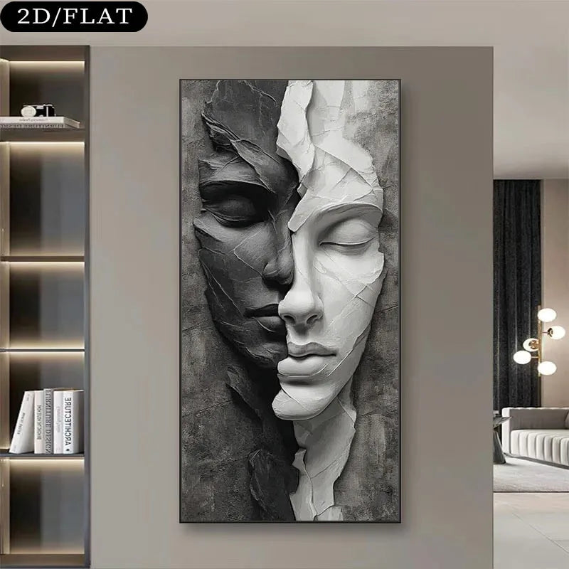 A large vertical black and white canvas wall art print featuring a sculptural face split into dark and light halves, displayed on a beige wall in a modern living room setting.