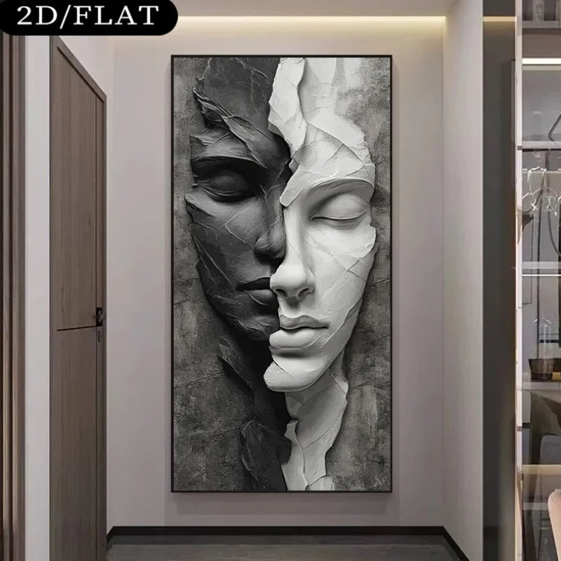 A large vertical wall art print showing a split human face in black, gray, and white sculptural style, displayed in a modern interior hallway. 