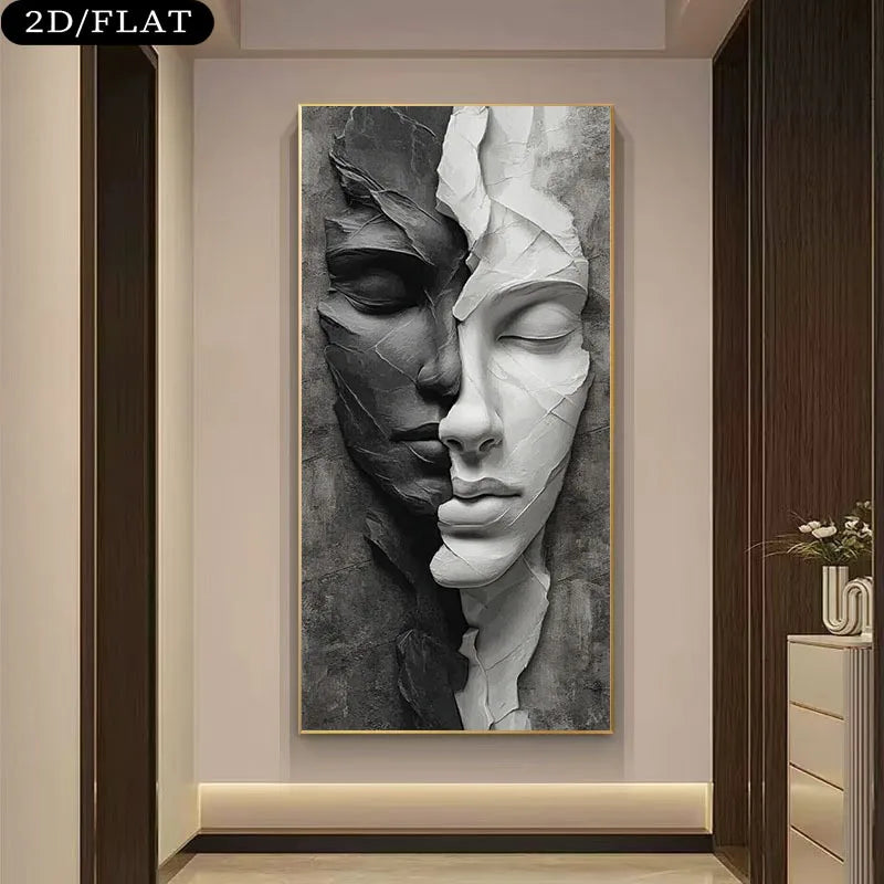 A vertical wall art print showing a split human face in black, gray, and white sculptural style, displayed on a beige wall in a modern interior hallway. The product itself is the artwork, and the surrounding room is visible as context.