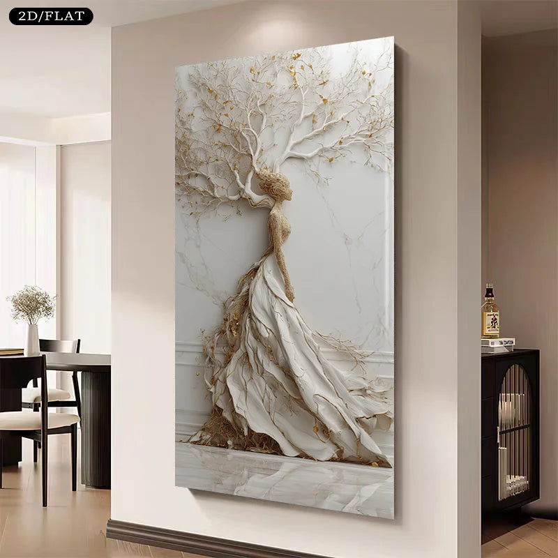 A large vertical canvas wall art print hanging on a beige wall in a modern interior. The artwork depicts a stylized white and gold tree with a flowing dress-like form in cream, gray, and metallic gold tones.