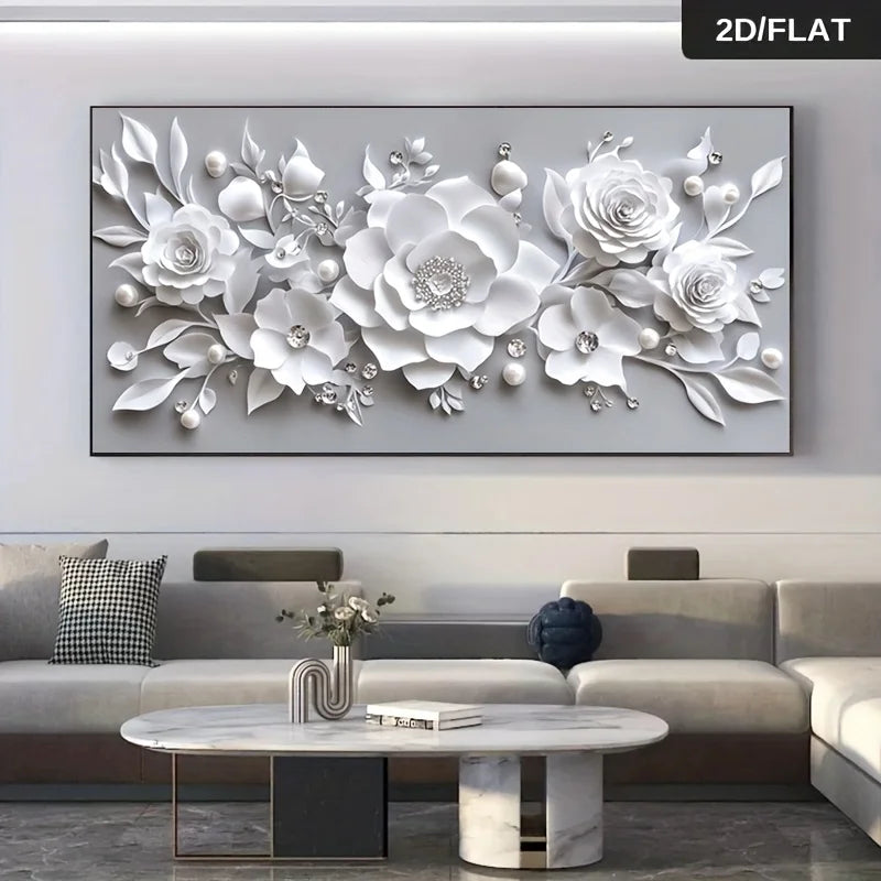 A large rectangular wall art piece showing a 3D-effect white floral design with layered roses, peonies, and leaves on a light gray background. The artwork is displayed above a modern beige sofa in a living room setting.