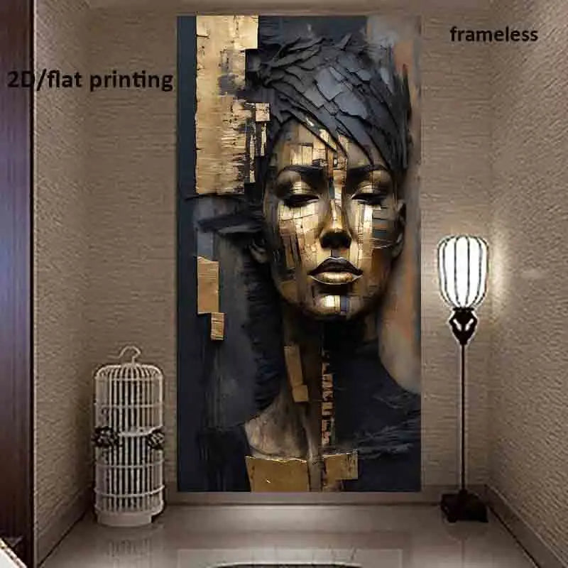 A large wall art print showing an abstract portrait of a woman's face in gold, black, and blue tones, displayed in a hallway next to a birdcage and a floor lamp. Text overlays read '2D/flat printing' and 'frameless'.