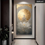 A vertical wall art print or canvas hanging in a hallway, featuring a seated meditating figure inside a large gold circular halo above a white lotus flower. The artwork is shown in a modern interior setting with dark walls, light flooring, and a plant at the left.
