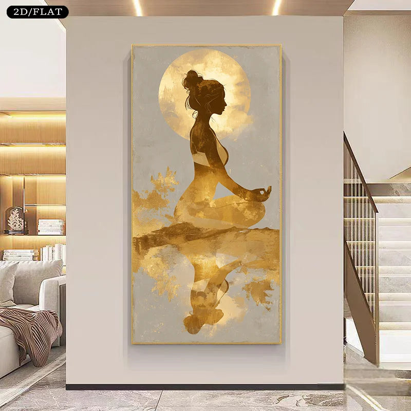A vertical framed wall art print showing a meditating woman silhouette in gold tones against a pale background, displayed in a modern interior hallway with a staircase and sofa visible.