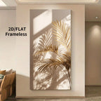 A large vertical wall art print showing stylized gold palm leaves cast in shadow on a beige background, displayed in a modern interior setting.