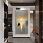 A vertical canvas wall art print featuring a sailboat on a reflective water surface at sunset, displayed in a modern hallway setting. The print has a gold border and is labeled with a black '2D/FLAT' sticker at the top.