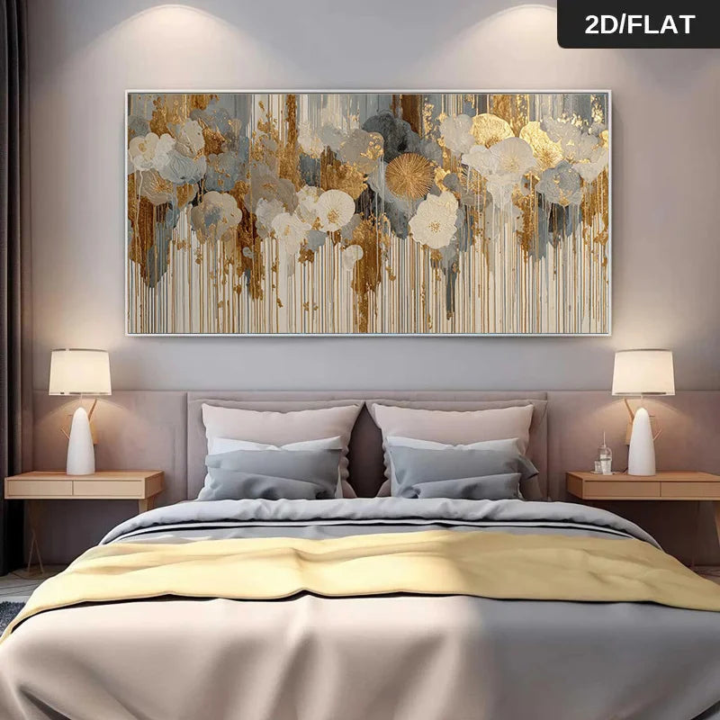 A large rectangular abstract wall art piece with gold, beige, gray, and white floral-like brushstrokes hangs above a neatly made bed in a modern bedroom. The scene includes bedside tables, lamps, pillows, and a gray headboard.
