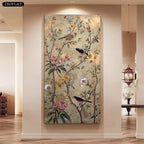 Decorative wall art with birds and flowers on a beige wall in a home setting.