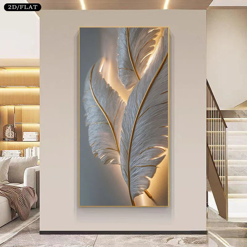 A vertical framed wall art piece featuring large white feathers with warm gold highlights, displayed in a modern interior hallway with a staircase and built-in shelving visible.