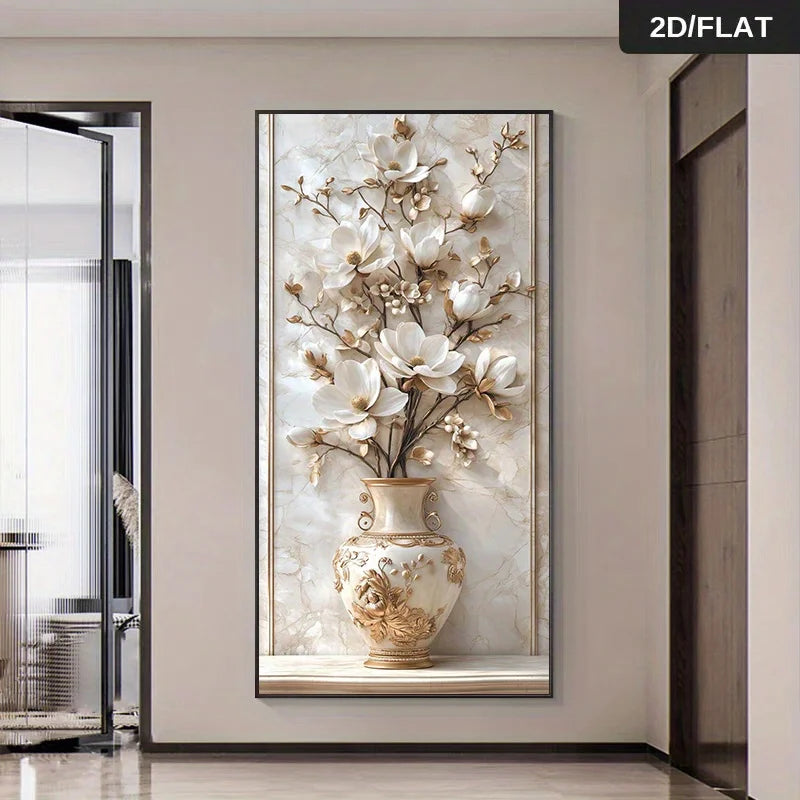 A vertical framed wall art print depicting white magnolia flowers in an ornate beige vase, displayed on a beige wall in a modern interior hallway. A small black label in the top right corner reads '2D/FLAT'.