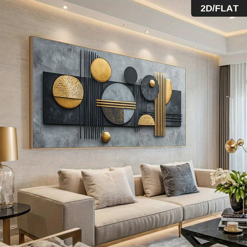 Large modern wall art piece with abstract geometric shapes in black, gray, and gold, displayed above a beige sofa in a styled living room.