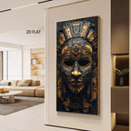 A large vertical wall art print showing an ornate gold and black ancient Aztec-style mask, displayed in a modern living room setting on a beige wall with the text '2D FLAT' visible nearby.