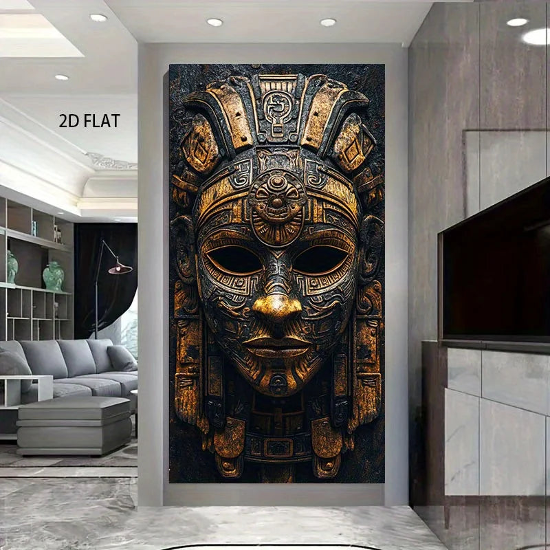 A large vertical wall art print showing an ornate golden Aztec-style mask on a dark background, displayed in a modern living room interior. The text '2D FLAT' appears in the upper left.