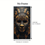 A wall art print or panel showing an ornate ancient Aztec-style mask in dark metallic tones, with dimension arrows and text indicating 70CM/27.55INCH width and 140CM/55.
