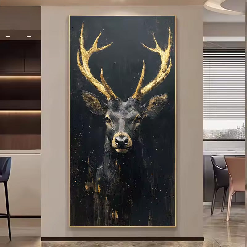 A vertical Nordic wall art piece featuring a dark deer or stag portrait with large golden antlers, displayed in a modern interior setting with a beige wall and surrounding furniture visible.