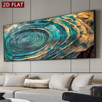 A large rectangular wall art piece with a 3D wood-grain texture effect, featuring concentric rings of teal, blue, and gold. It is displayed on a light gray paneled wall above a modern white sofa in a living room setting.