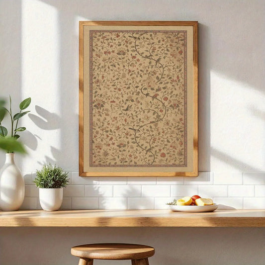 A framed botanical art print with a beige background, delicate floral patterns, and a light wood frame, hanging on a white wall above a wooden shelf with decorative plants and a fruit plate.